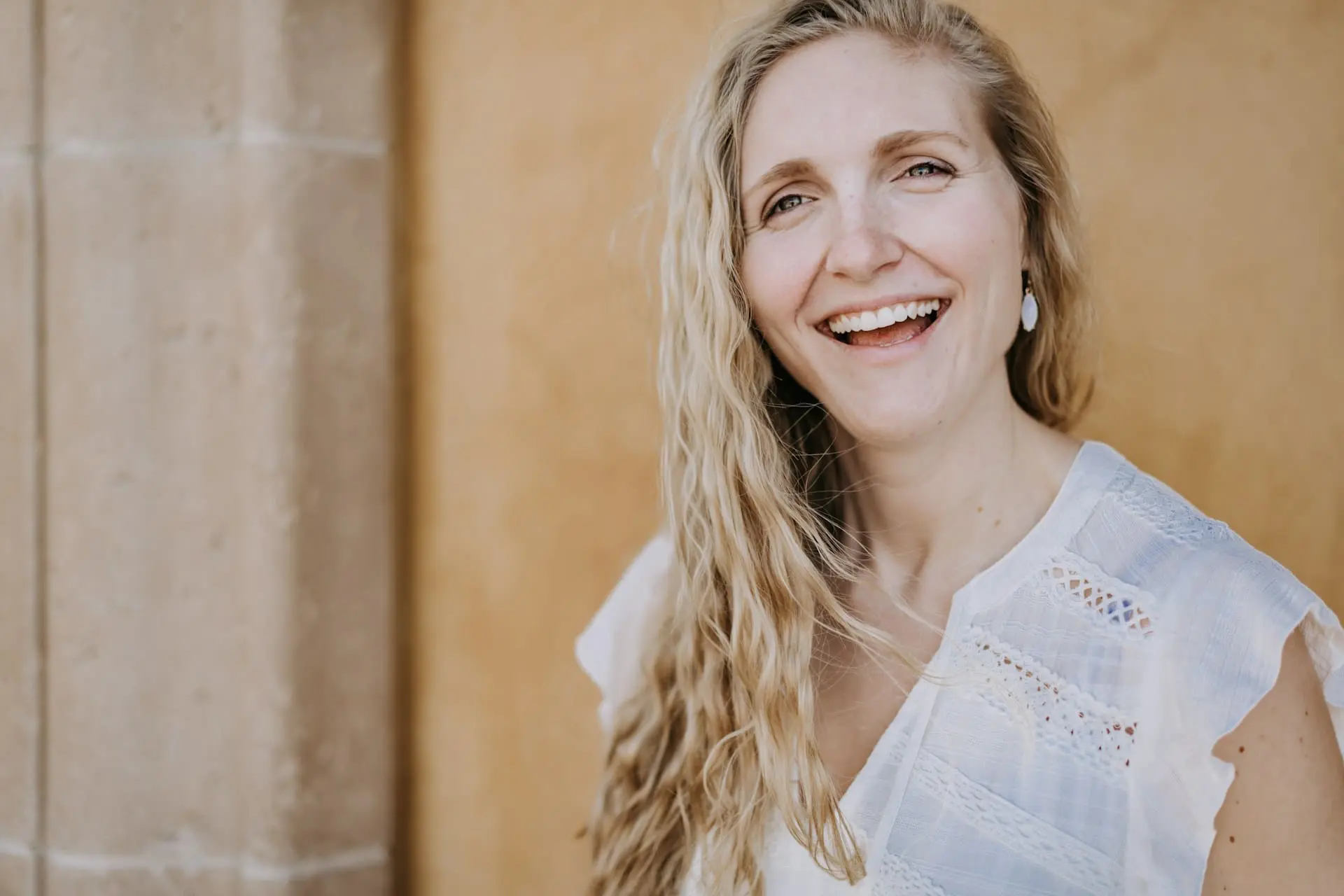 woman smiling with straight white teeth