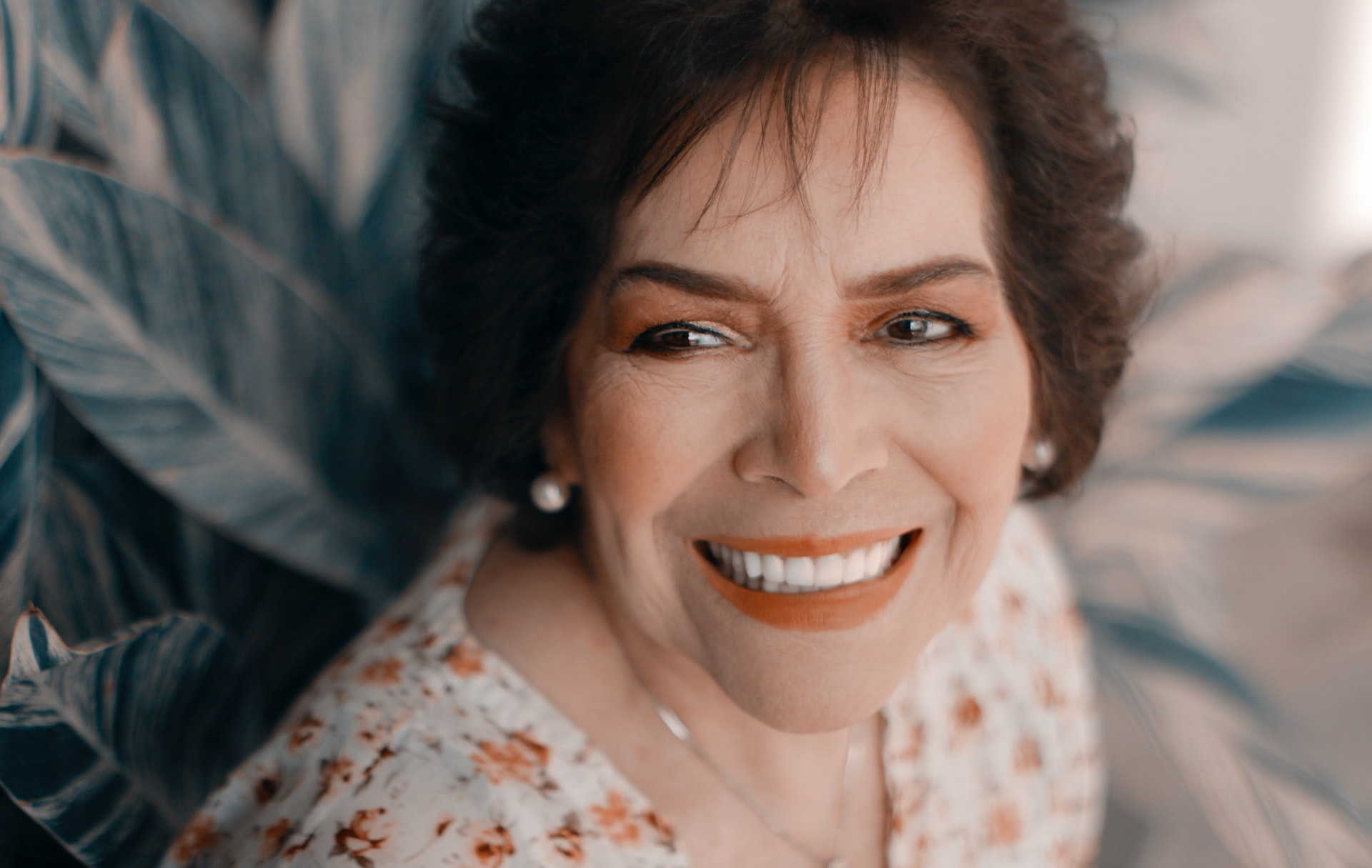 what is a hybrid denture - senior woman smiling